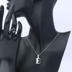 عقد فضة مع خاتم  حرف نسائي عيار 925