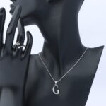عقد فضة مع خاتم  حرف نسائي عيار 925