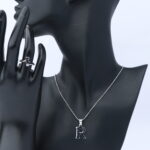 عقد فضة مع خاتم  حرف نسائي عيار 925