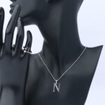 عقد فضة مع خاتم  حرف نسائي عيار 925