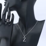 عقد فضة مع خاتم  حرف نسائي عيار 925
