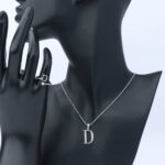 عقد فضة مع خاتم  حرف نسائي عيار 925