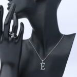 عقد فضة مع خاتم  حرف نسائي عيار 925